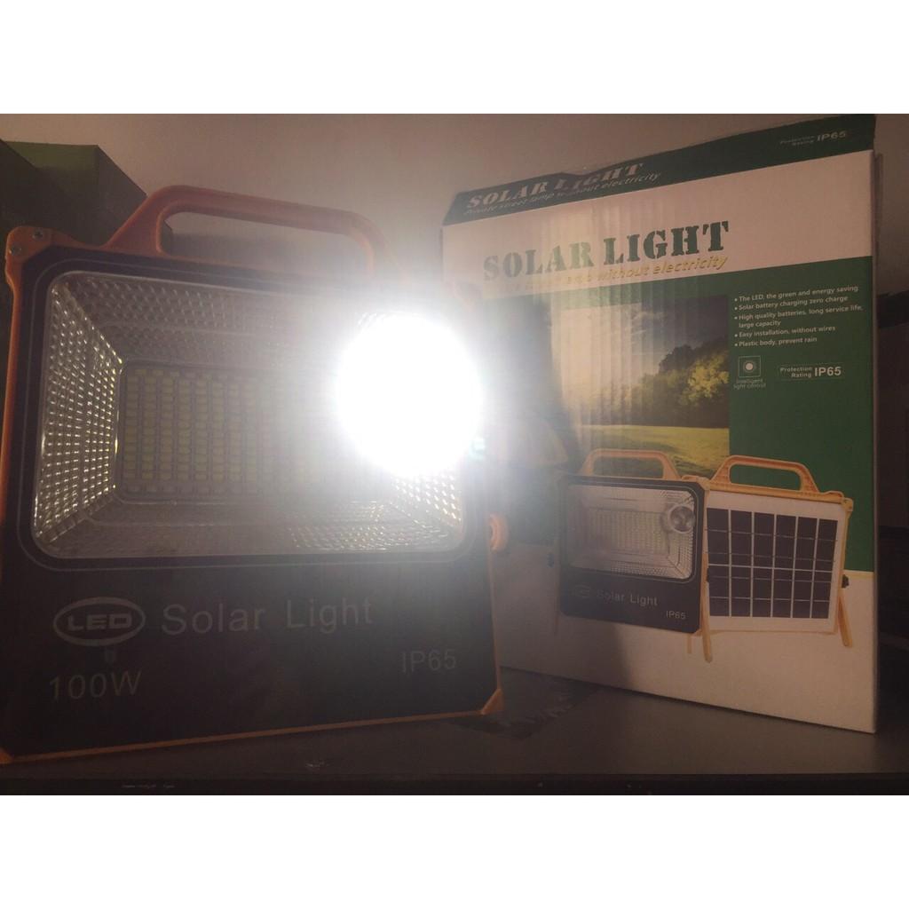 Đèn Pha Led Năng Lượng Mặt Trời 100w Cầm Tay, Sạc Được Cả Điện 220V&amp; Năng Lượng Mặt Trời