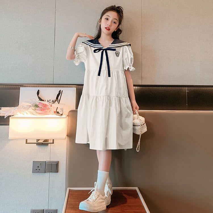 DONGSHOP Cô gái mùa hè ăn mặc 2023 mùa hè trẻ em gái trung bình bé lớn lỏng lẻo Hàn Quốc đại học gió ăn mặc