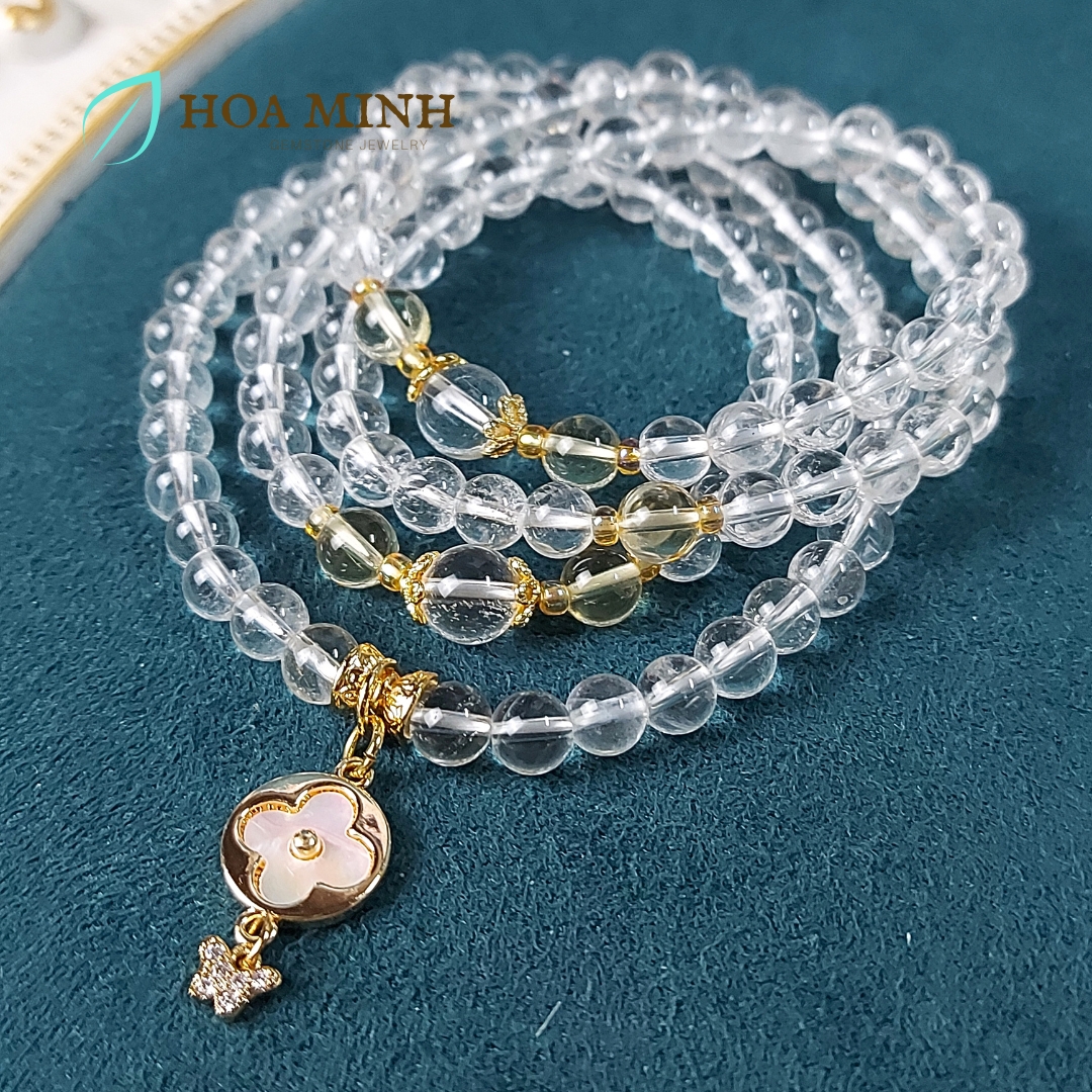 Vòng chuỗi 108 hạt Thạch Anh Trắng pha lê size hạt 6 li phối charm cỏ 4 lá và bướm nhỏ đính đá, ốp hoa, thạch anh vàng