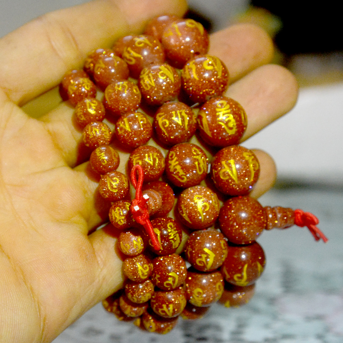 Vòng tay chuỗi đá kim sa khắc chú Omani vàng