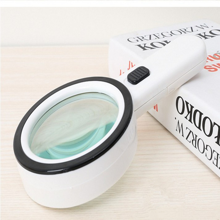 Kính lúp cầm tay đường kính 80mm đọc sách báo K2288 cao cấp