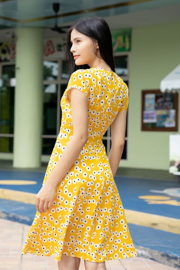 Đầm xòe hoa cúc cột nơ màu vàng EV11