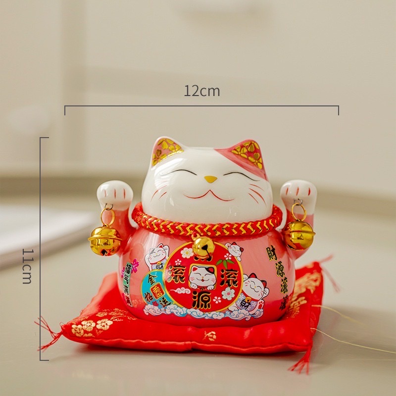 Mèo thần tài lục lạc  may mắn thu hút tài lộc , có khe để tiền , kèm đệm lót xinh xắn  , đem nhiều may mắn đến cho gia chủ