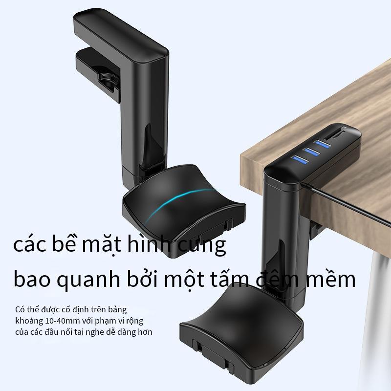 Móc treo tai nghe phong cách mới nhất Chân đế tai nghe miễn phí đấm khung xoay bàn máy tính USB mở rộng móc tai nghe