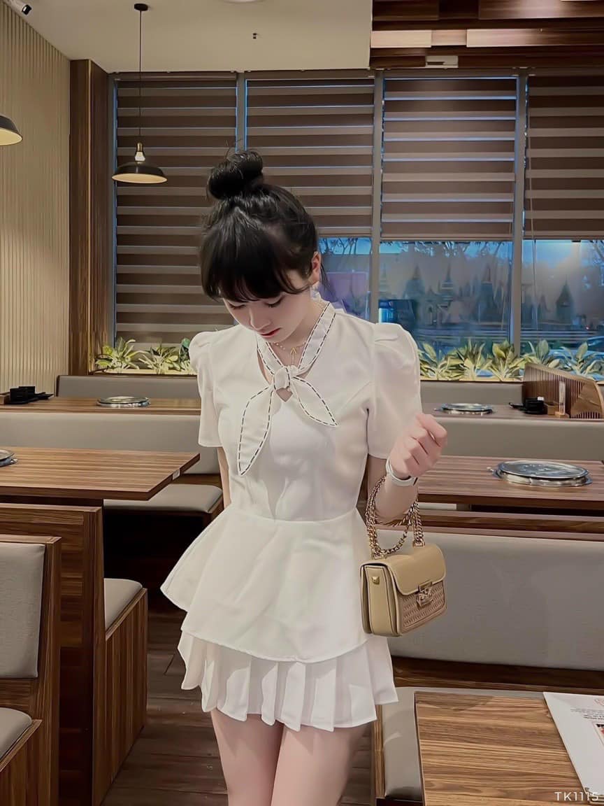 Áo peplum chỉ nổi cột nơ cổ điệu đà, sang trọng