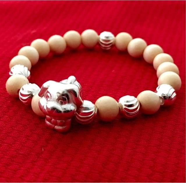 Vòng dâu trẻ em cham con chó Bạc QTJ - VTE01