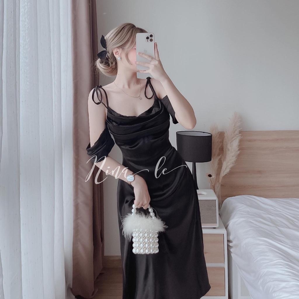 Đầm váy dự tiệc hai dây trễ vai xếp ly ngực màu trắng tinh khôi giúp nàng nổi bật.