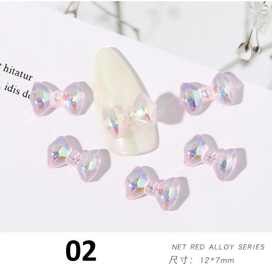 Charm nơ tráng gương cầu vòng đính móng BYH004