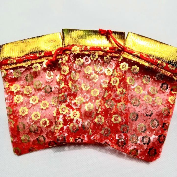 Túi voan đỏ kích thước 9x15cm có dây rút tiện lợi, đựng gạo muối, trang sức đem may mắn tài lộc bình an