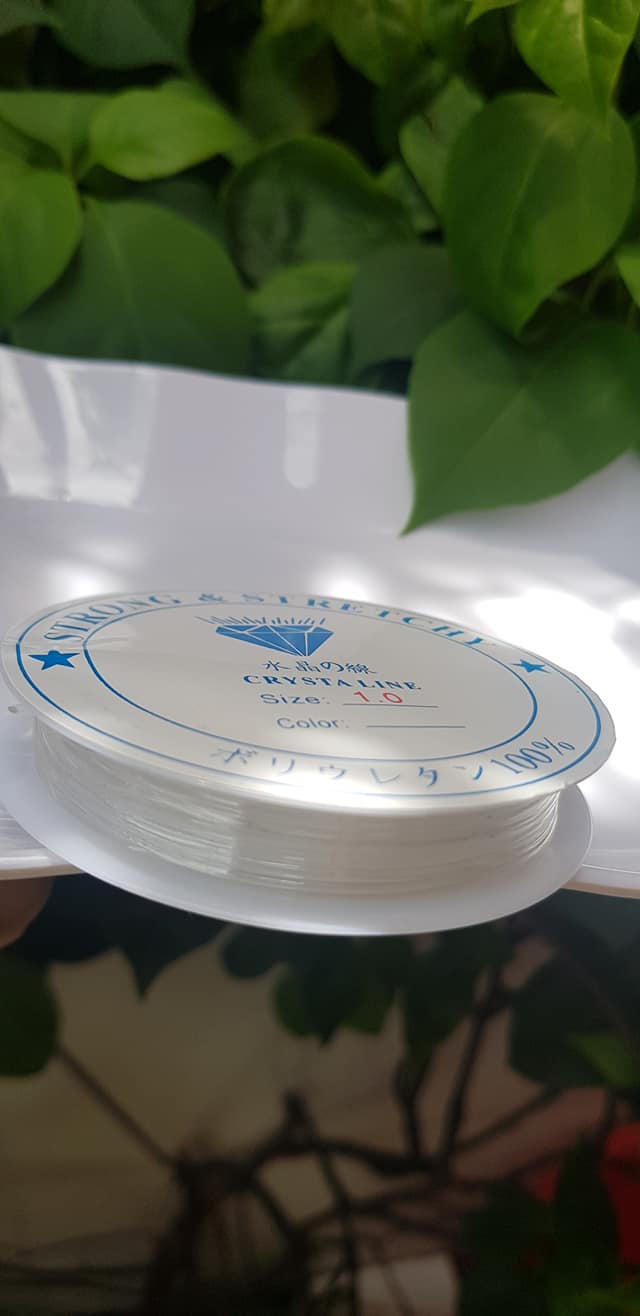 Khoanh tròn cuộn Thun Dẻo Màu trắng nhỏ chuyên xỏ tất cả vòng đeo tay Thun dẻo trắng xỏ vòng tay nam nữ ạ