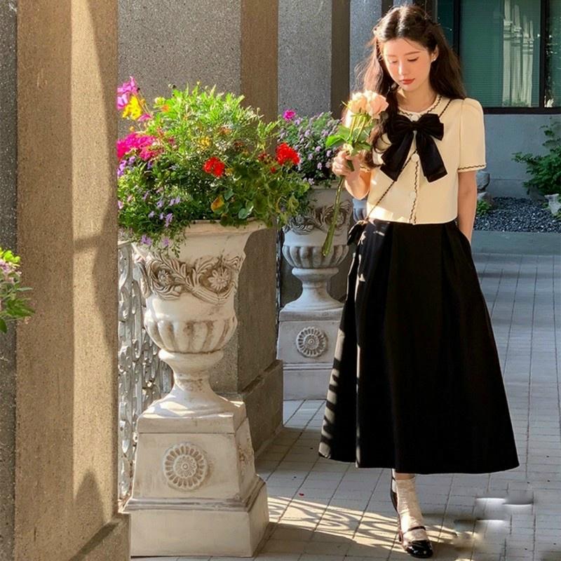 TCO set áo croptop chạy viền ren phối nơ ngực kèm chân váy đen xòe tiểu thư
