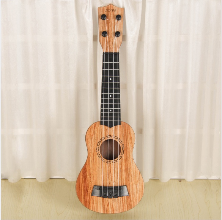 Đồ chơi đàn guitar mini vân gỗ cho trẻ tập chơi đàn