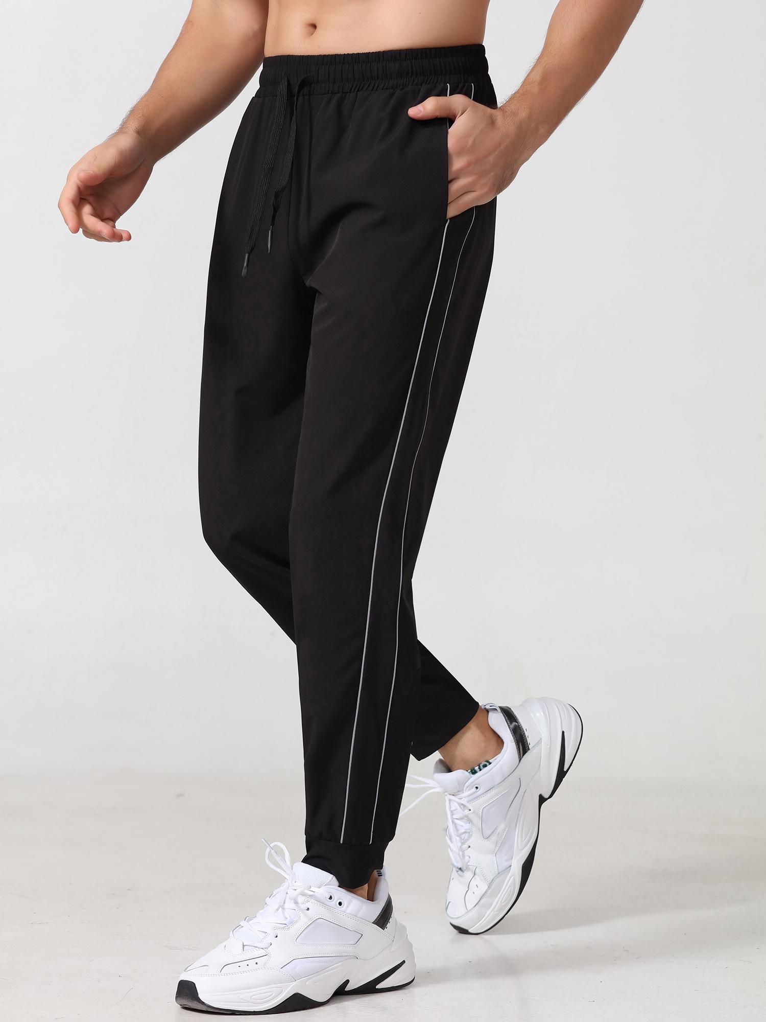 Quần Jogger Nam Quần thể thao có túi có dây phản quang Chạy bộ tập thể thao Người chạy bộ thể thao