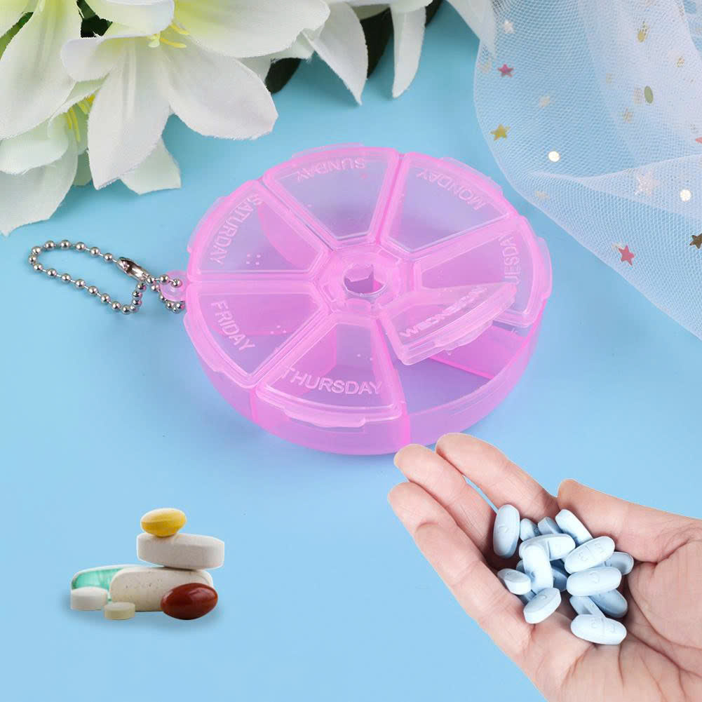 Hộp nhựa hình tròn chia 7 ngăn đựng thuốc uống theo ngày nhiều màu sắc - Giao màu ngẫu nhiên
