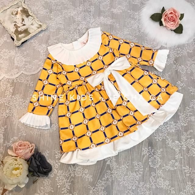 Váy vàng M cổ bèo trắng cho bé