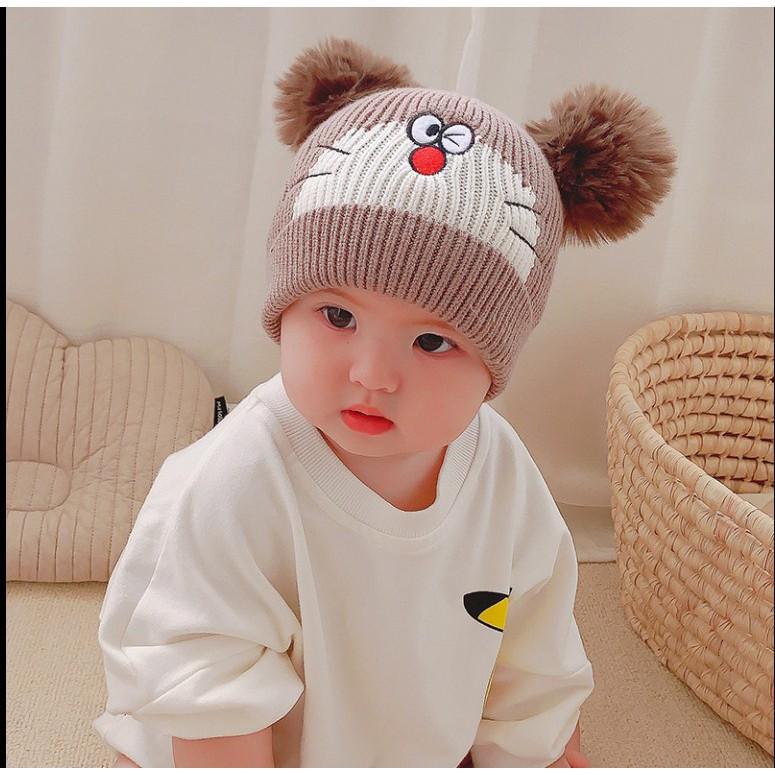 Mũ nón len Mèo Doremon đội mùa đông cho bé trai bé gái dưới 1 tuổi có Hai Quả Bông hình Mèo Doremon 2020