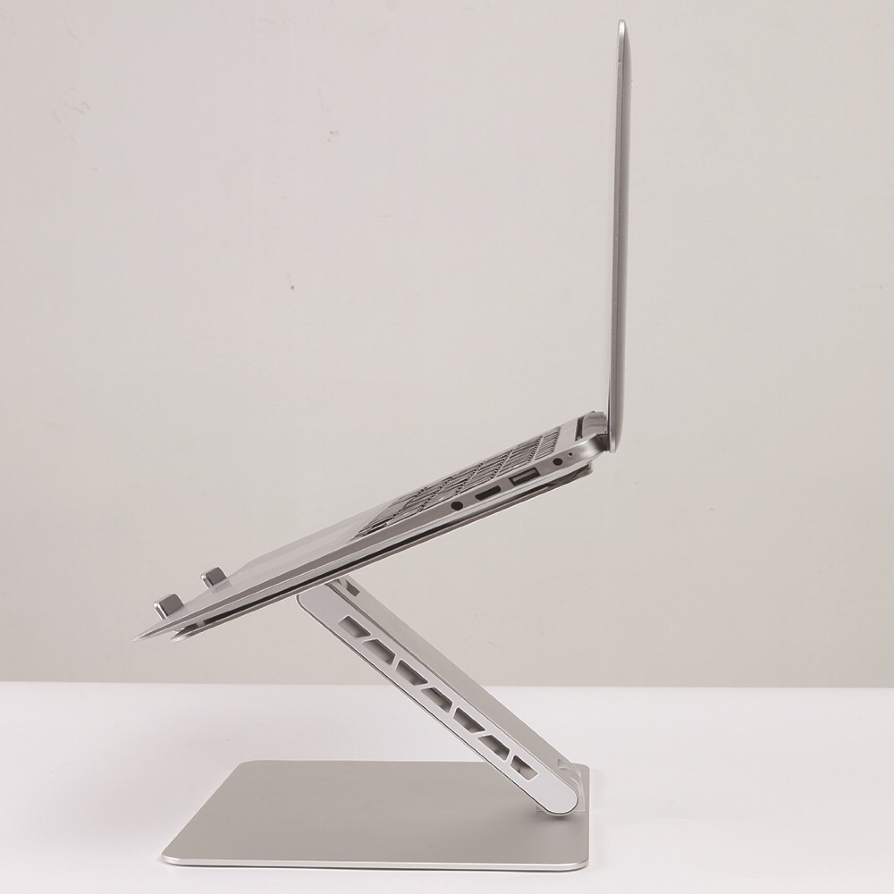 Giá đỡ nâng laptop stand nhôm nguyên khối một chân T2