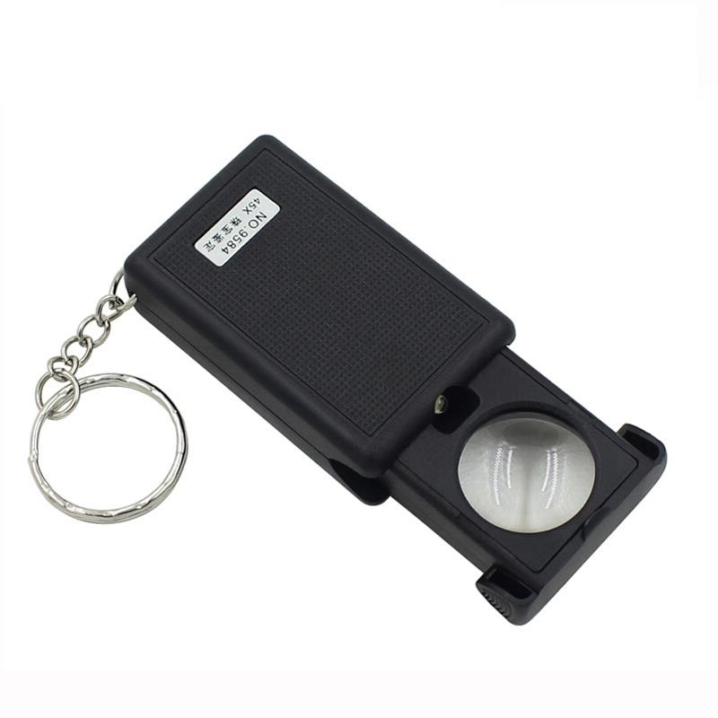 Kính lúp thấu kính phóng đại 45 lần đèn led mini trợ sáng có móc treo đa năng