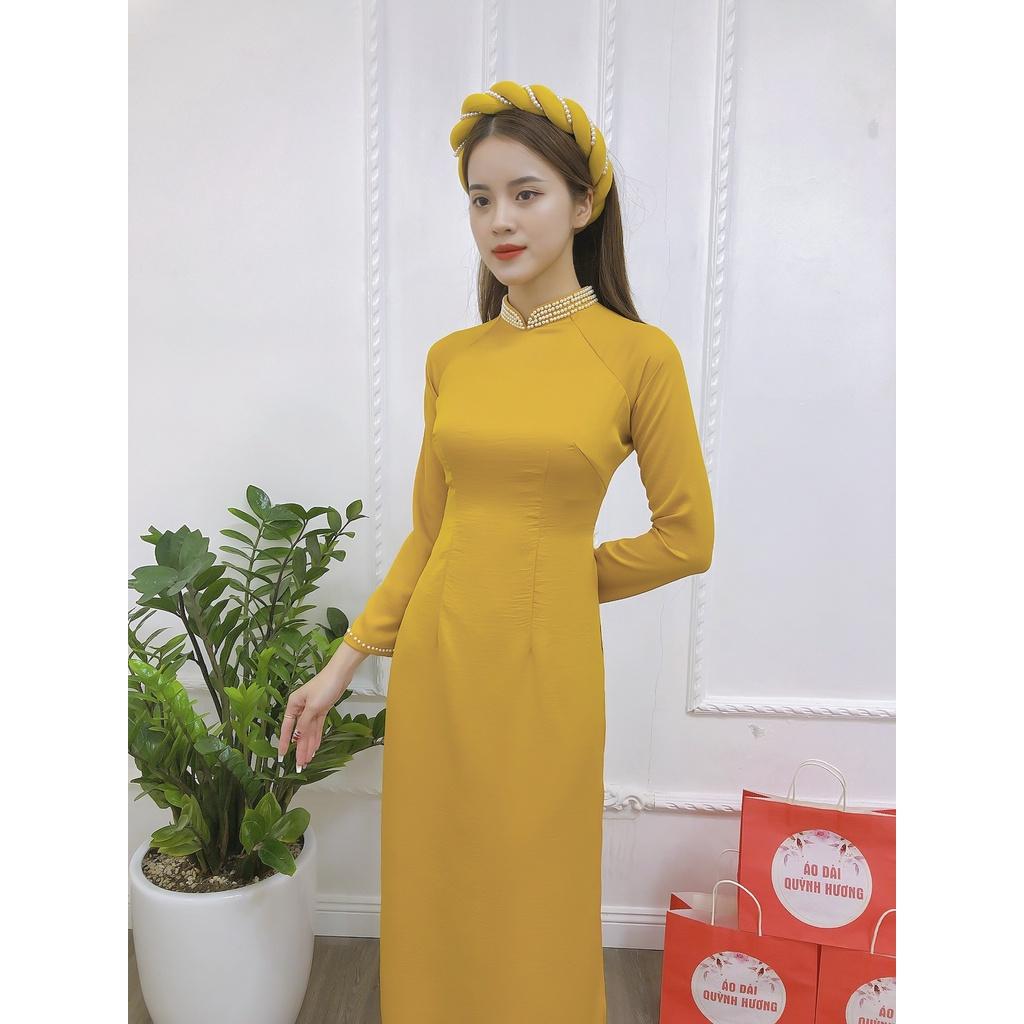Áo dài lụa tây thi màu vàng cổ truyền thống đính hạt by Quỳnh Hương