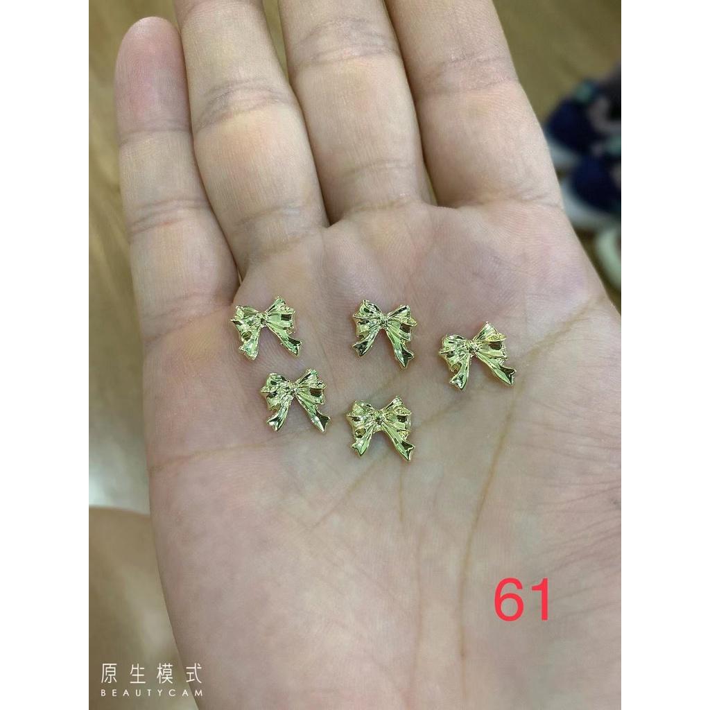 charm trang trí nail mã 61