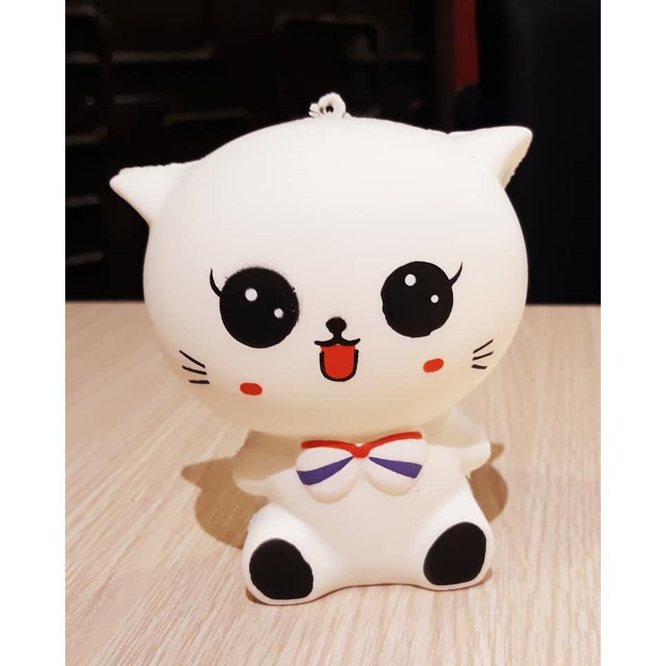 xSquishy mèo trắng đeo nơu