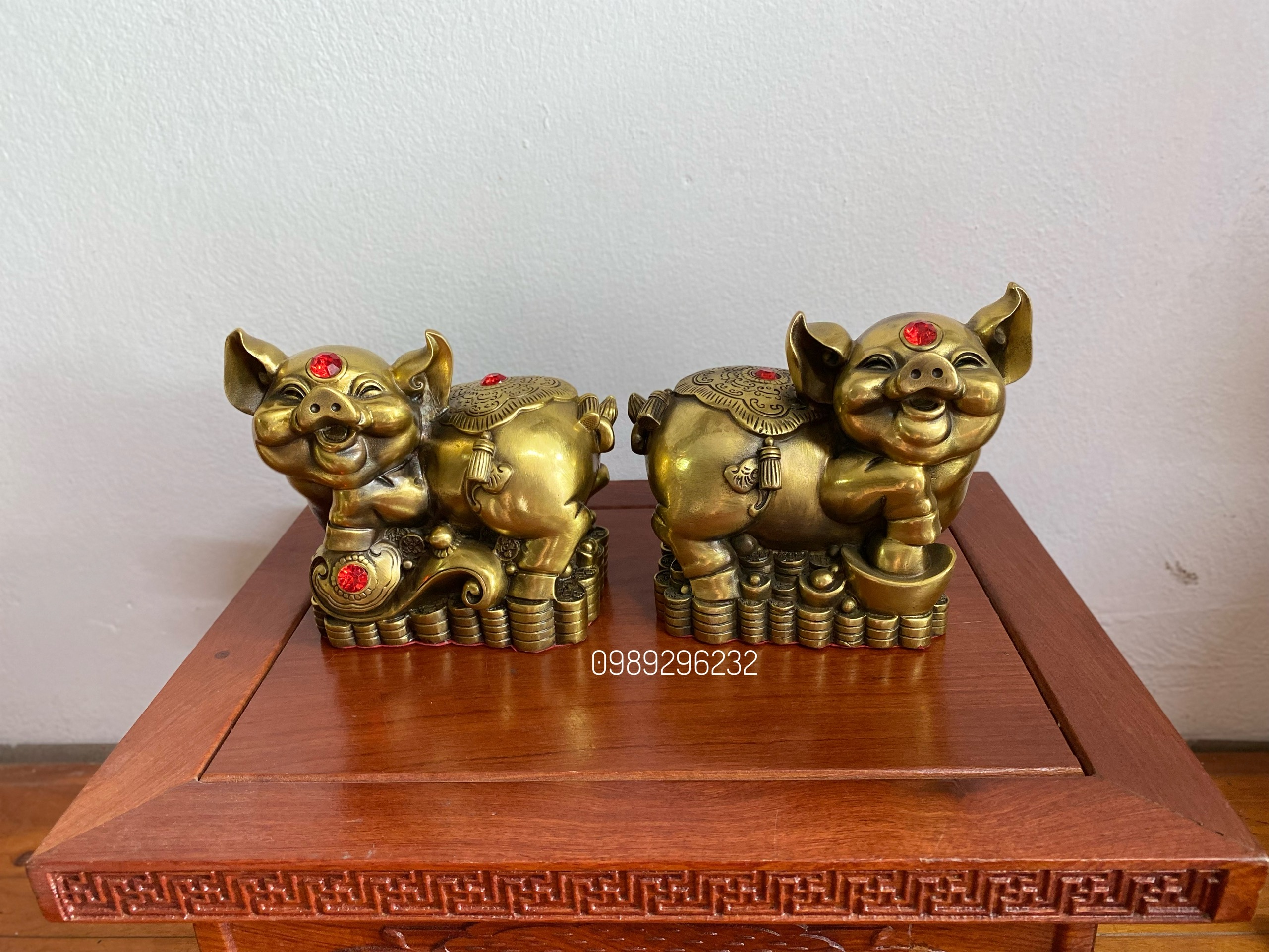 Cặp heo cầu tài lộc bằng đồng vàng