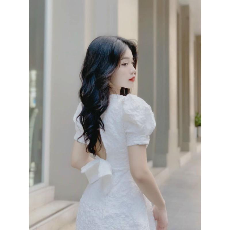 Đầm dự tiệc gấm xòe nơ lưng trắng