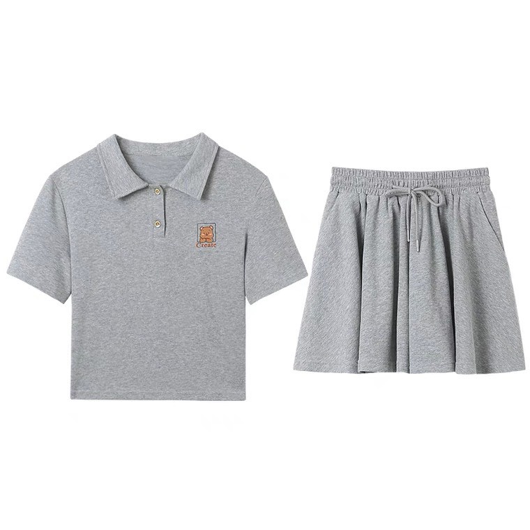 Bộ Áo Thun Cổ Polo In Hình Logo Ngực Kèm Quần Váy Dáng Xòe