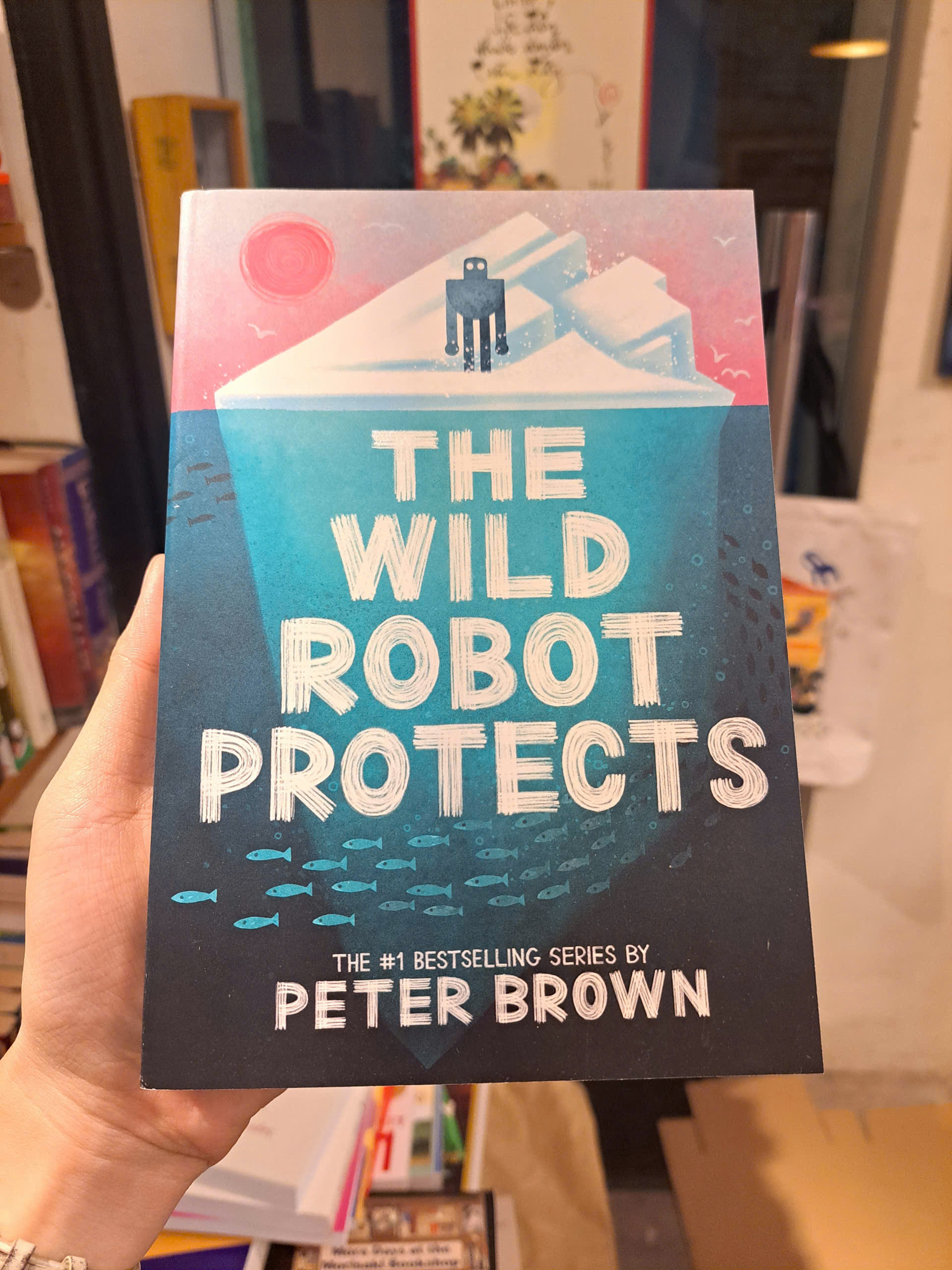 Sách - The Wild Robot Protects by Peter Brown | Children's Novel / Tiểu thuyết thiếu nhi tiếng Anh