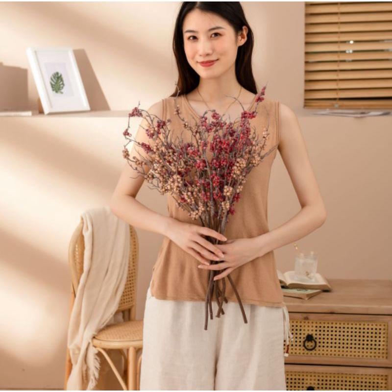 Cành trang trí mô phỏng cành quả mắt ngọc mang phong cách đơn giản nhưng hiện đại, trang nhã
