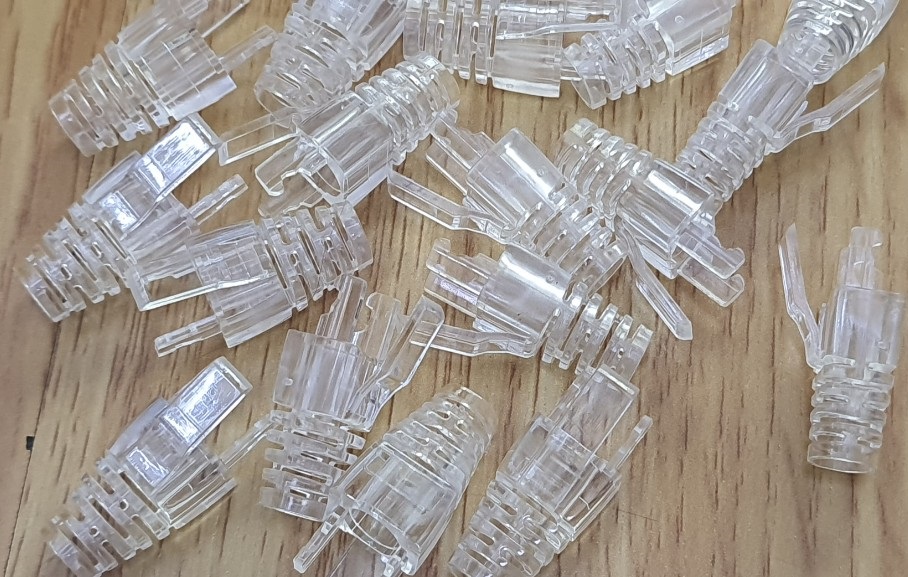 Đầu chụp hạt mạng RJ45 Cat5e, Cat6 màu trắng trong có móc gài ( túi 100 chiếc)