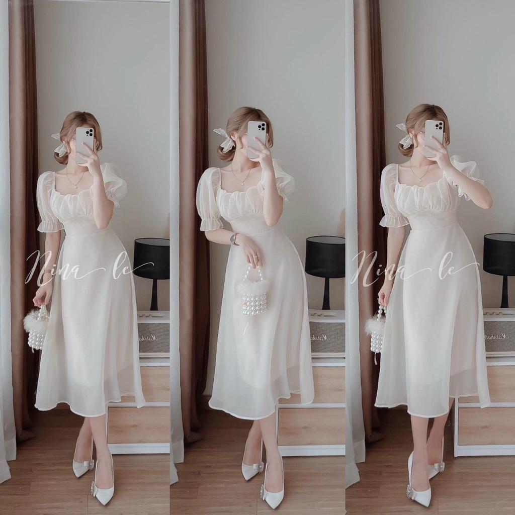 Đầm trắng xoè tiểu thư cổ vuông tay phồng xếp ly ngực