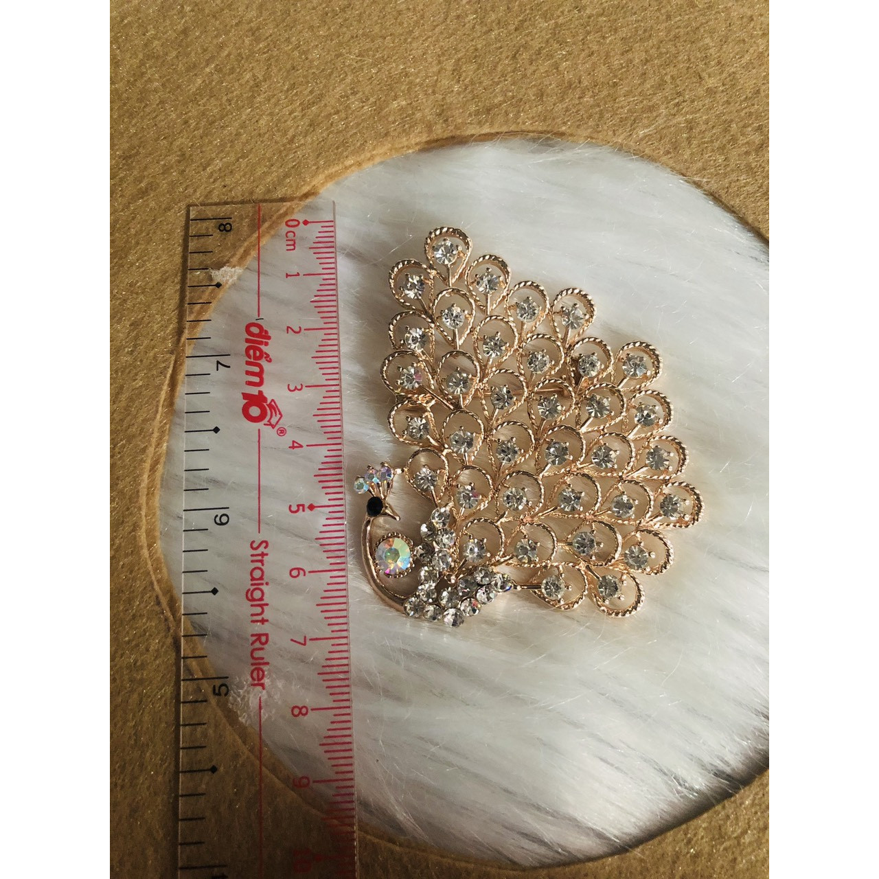 Cài áo con công đính đá trắng cao cấp. KT 6 x 7cm