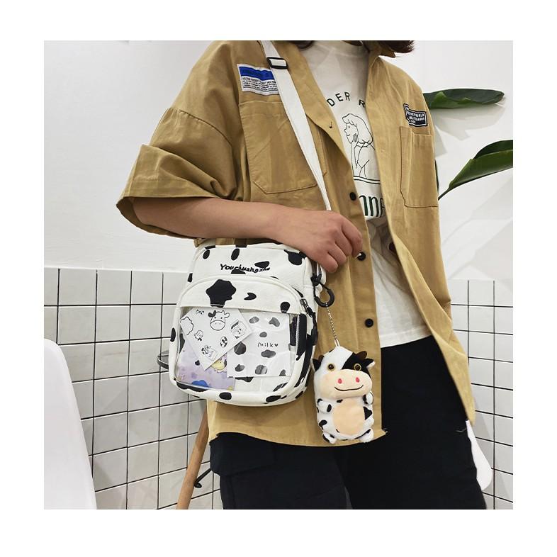 TÚI ĐEO CHÉO NAM NỮ HỌA TIẾT BÒ SỮA