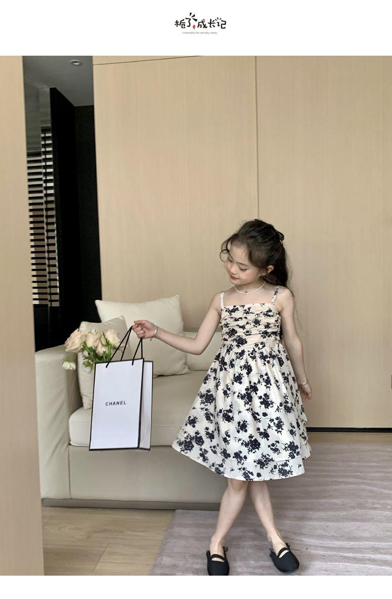 SHUANGYAN Yuanbaoth trẻ em ăn mặc thời trang phù hợp với phong cách phương Tây mùa xuân ăn mặc trẻ em gái mảnh hoa sling váy dệt kim áo choàng