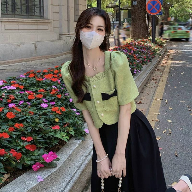 Set áo croptop đính nơ kèm chân váy xếp ly ulzzang