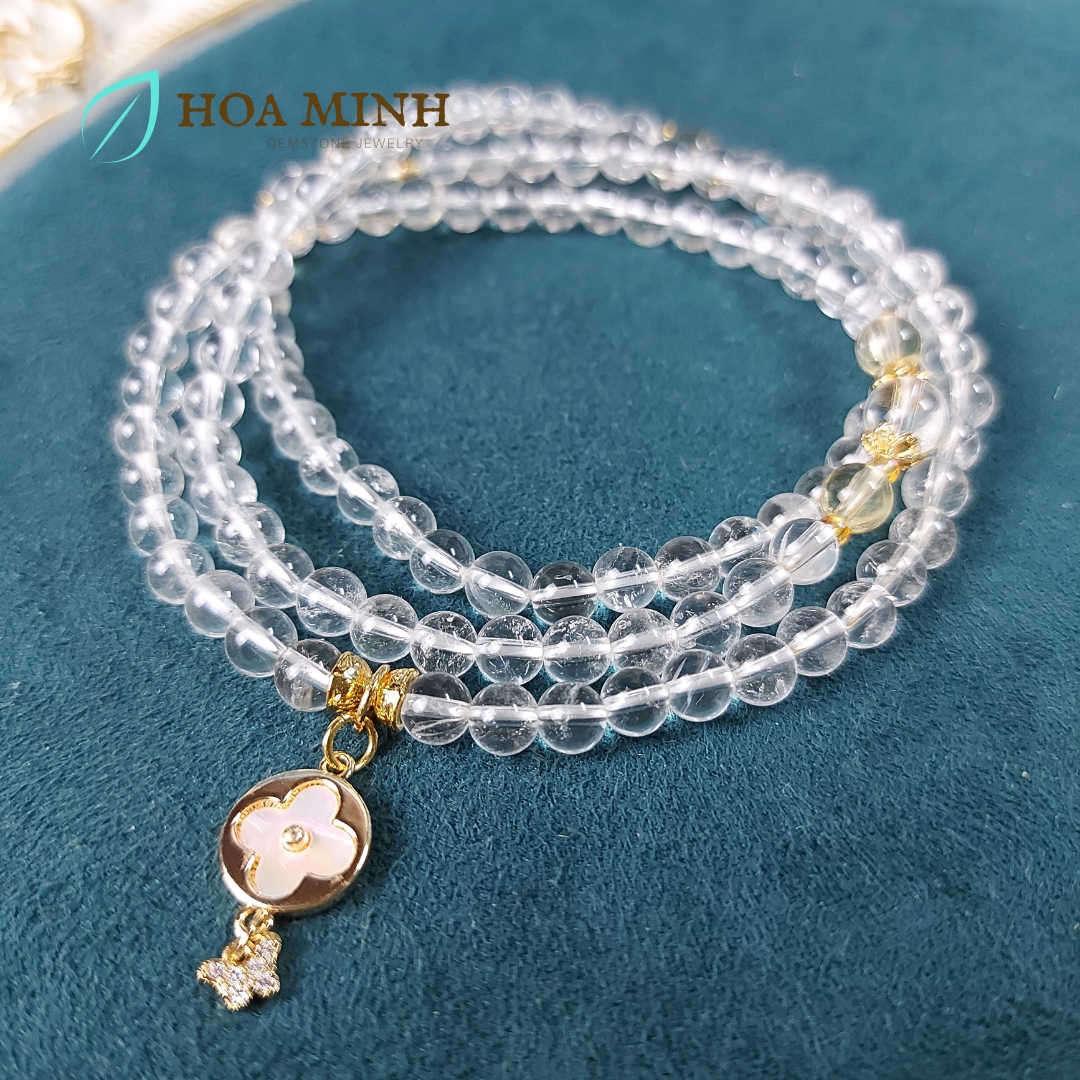 Vòng chuỗi 108 hạt Thạch Anh Trắng pha lê size hạt 6 li phối charm cỏ 4 lá và bướm nhỏ đính đá, ốp hoa, thạch anh vàng