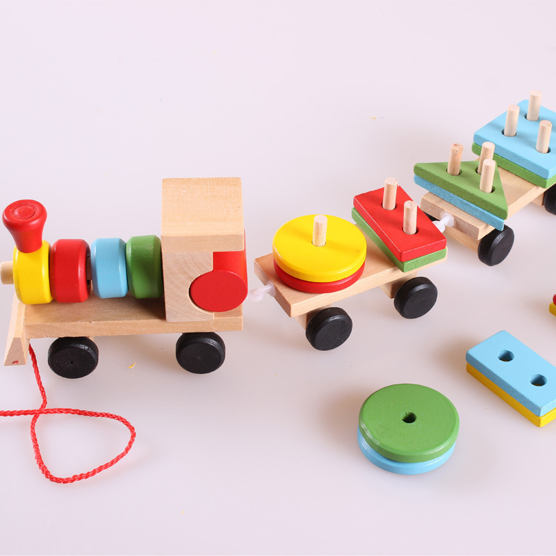 Đồ chơi xếp hình - đoàn tàu gỗ chở hình khối giúp bé nhận biết màu sắc, hình học, phát triển trí tuệ