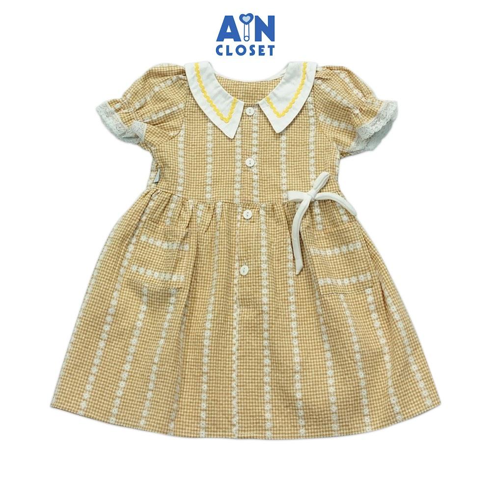 Đầm bé gái họa tiết Caro nhí vàng cổ sơ mi cotton - AICDBGMMOMJL - AIN Closet