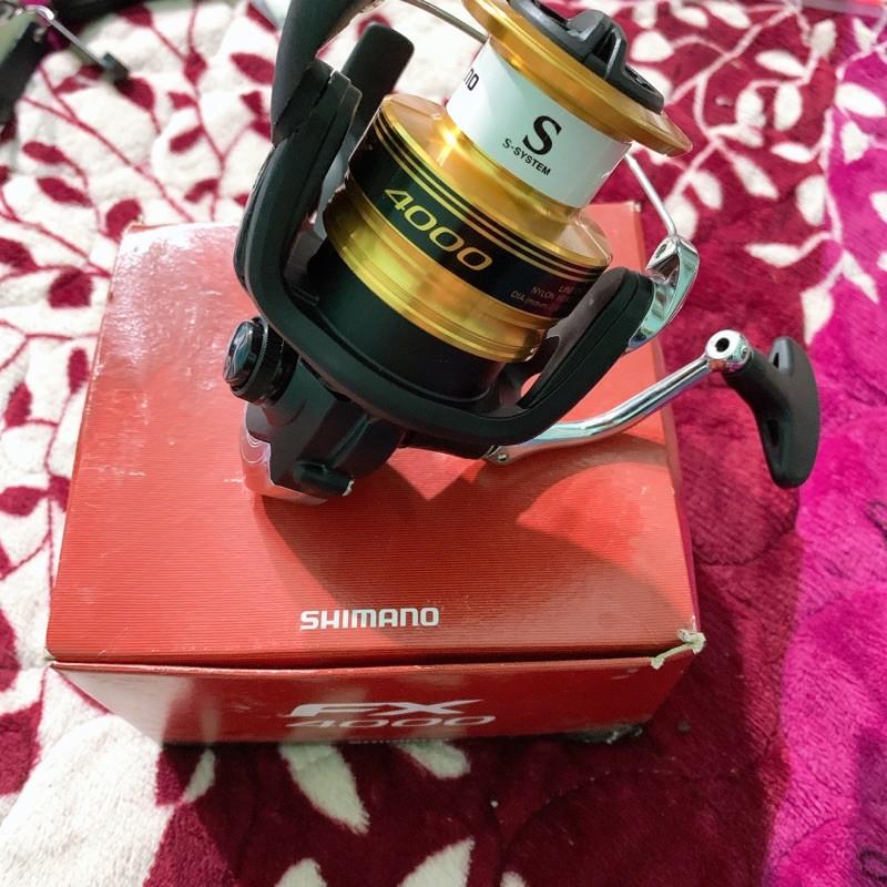Máy câu cá FX 4000 shimano máy tải cá lên 10kg y hình máy quay rất êm
