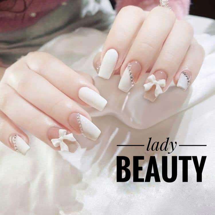 Nailbox thiết kế móng tay giả gắn nơ trắng