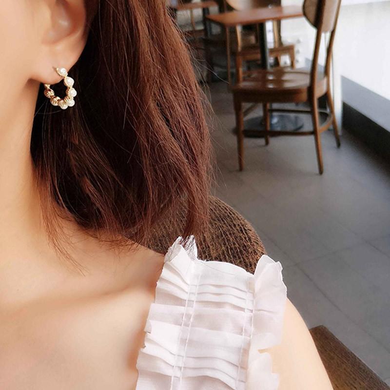 Khuyên tai trái tim đính hạt giả ngọc trai