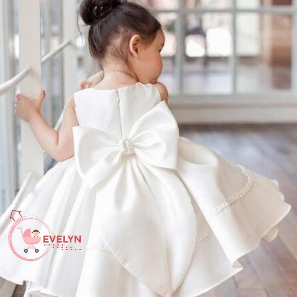Đầm bé gái Satin trắng đính nơ sau lưng