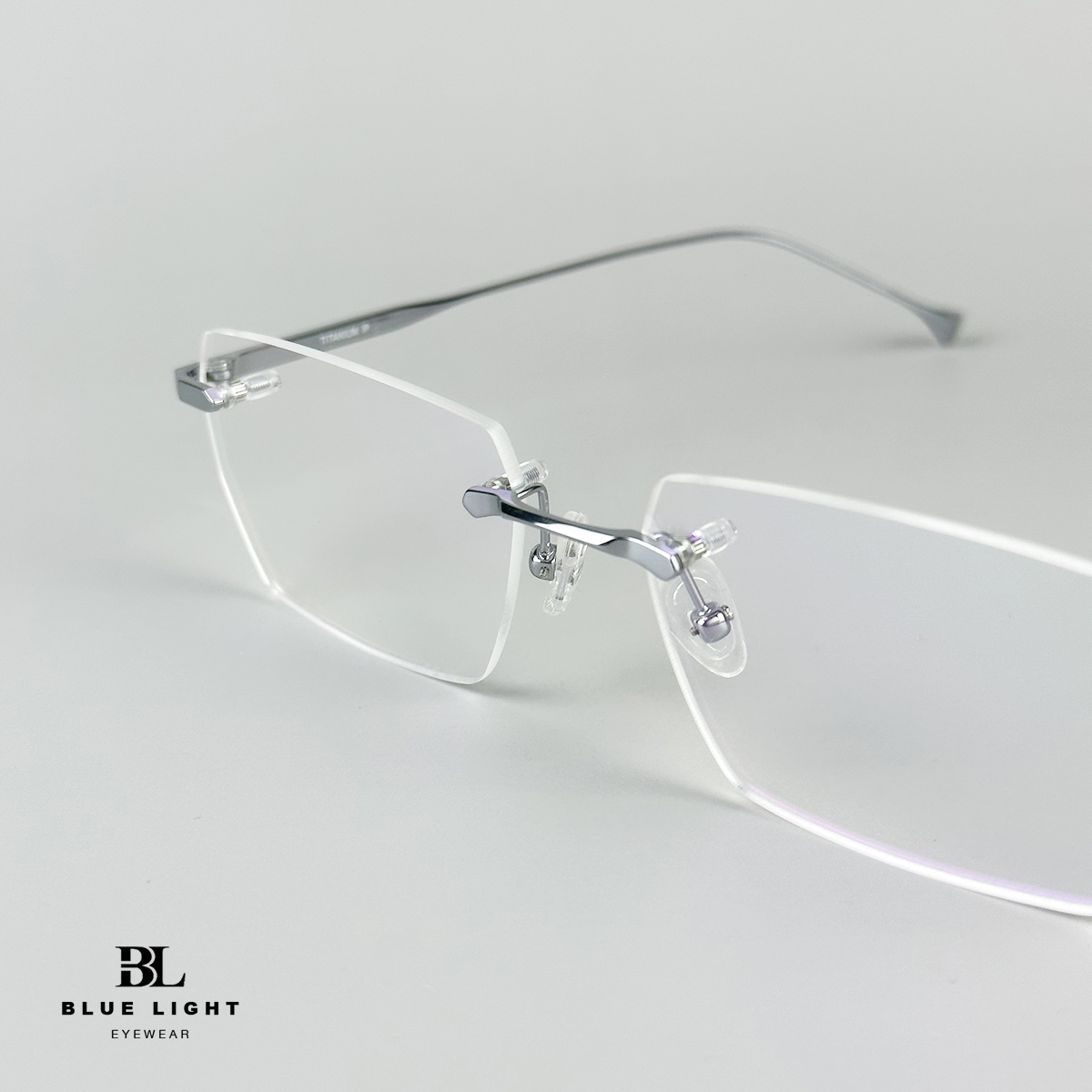 Gọng Kính Cận Giả Cận Nam Nữ Cao Cấp Titanium BLUE LIGHT Mắt Khoan Không Viền Chữ Nhật Bạc Đen Vàng Dày Dặn Cứng Nhẹ