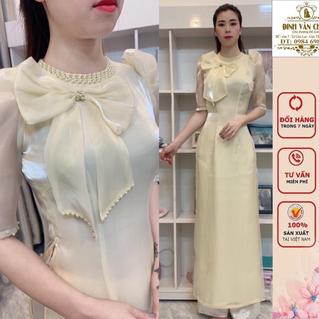 Áo dài tơ sống nơ ngực điểm trai full cổ màu da sáng