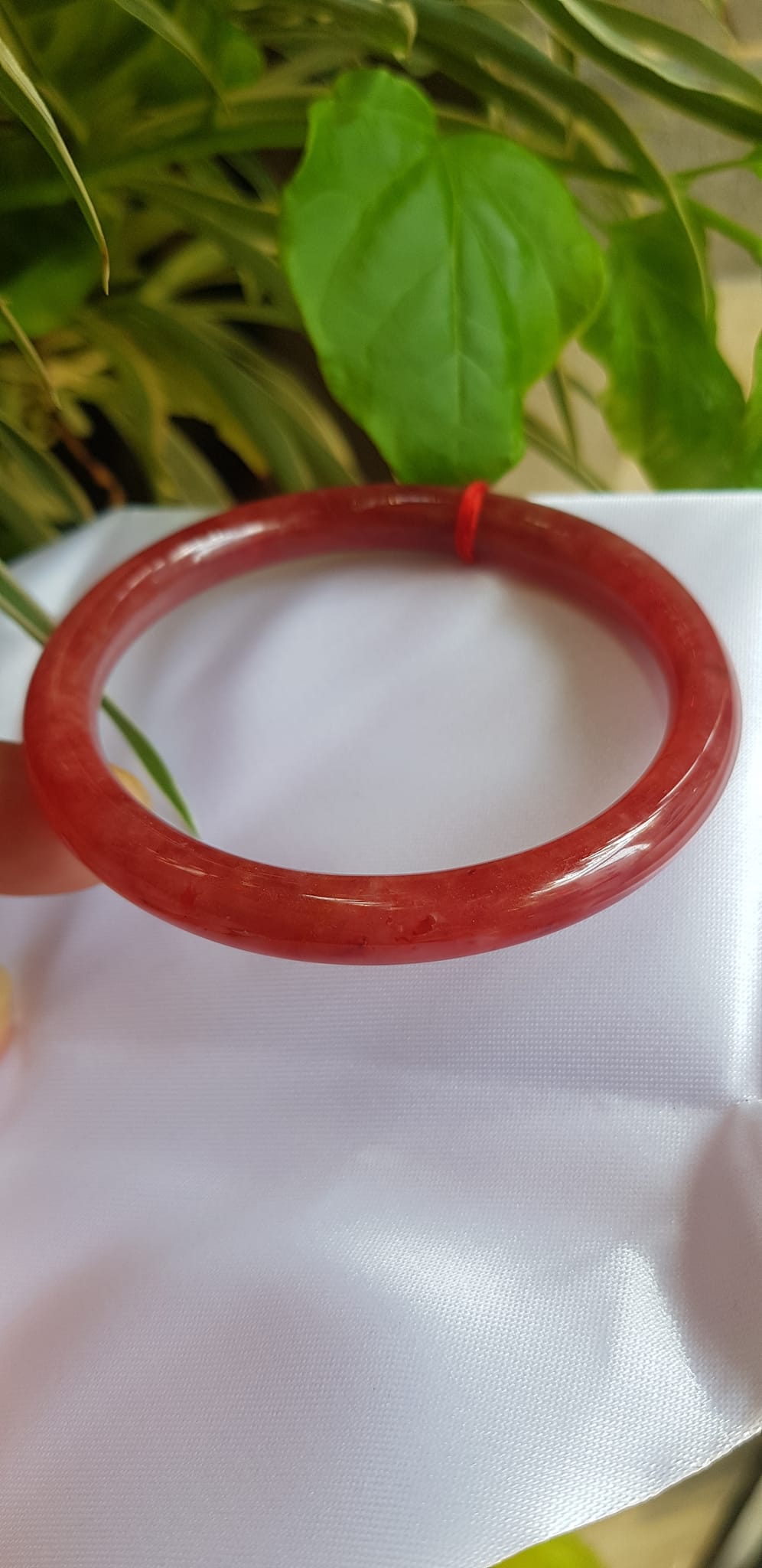 Vòng Cẩm Thạch Đỏ đẹp 58mm x chột 7mm màu đỏ đậm bóng là màu chiến thắng chuẩn hợp nữ mạng hỏa mạng thổ 55kg - 68kg đeo đẹp tay may mắn tốt sức khỏe công việc rực rỡ tài lộc ạ