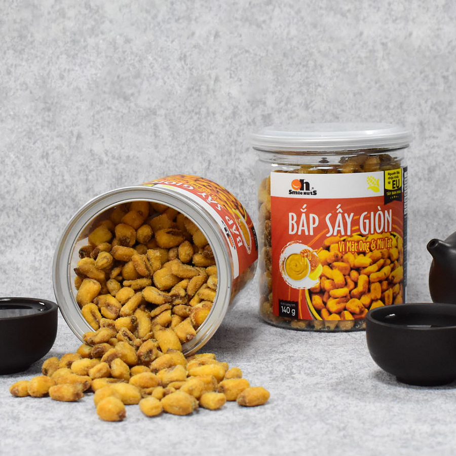 Bắp Sấy Giòn Smilenuts vị Mật Ong &amp; Bù Tạt hộp 140g _ Nhập khẩu từ Tây Ban Nha _ Bắp sấy giòn rụm, thơm ngon, tẩm vị vừa ăn _ phù hợp ăn vặt, snack bắp rang/sấy hảo hạng