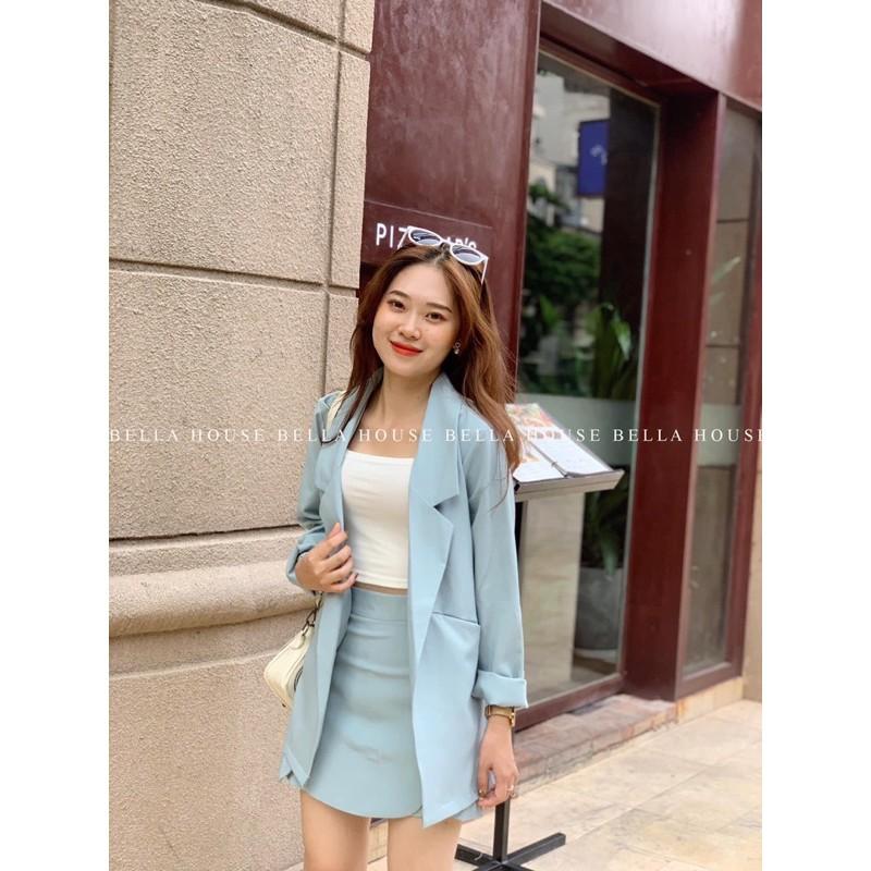 Áo Blazer không khuy xanh và quần váy lượn sóng