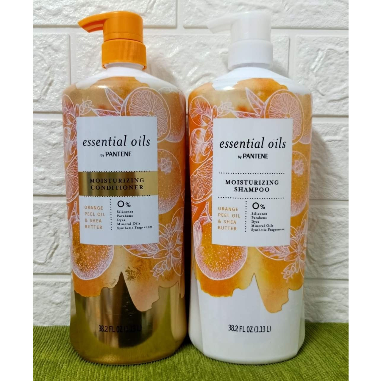 Bộ Dầu Gội Xả Pantene Cam Essential Oils by Pantene Orange Peel Oil &amp; Shea Butter Hương cam 1.13L