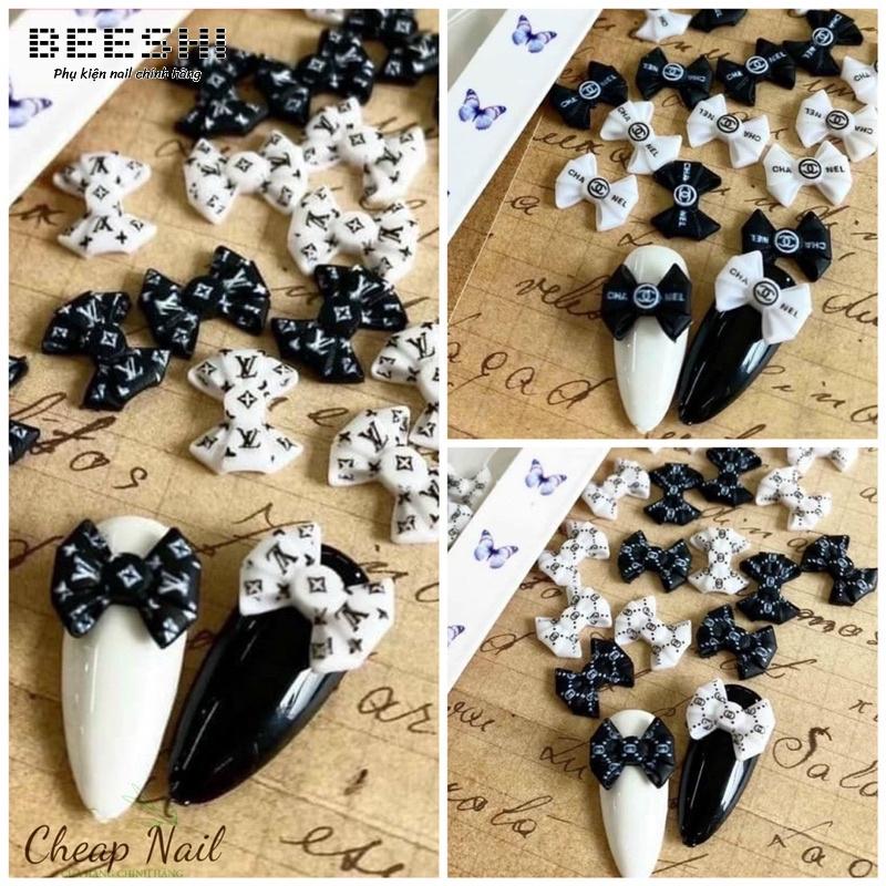 Nơ bột nail, nơ nhựa nail 1 túi 17-20 viên - beeshi shop nail